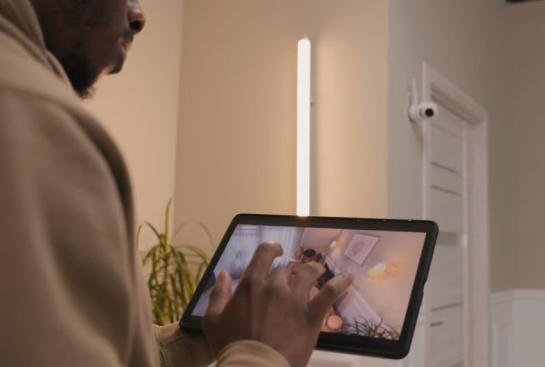 nan holding a tablet